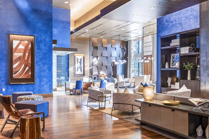 Spacious clubhouse lobby with modern seating at Flatiron Domain Apartments