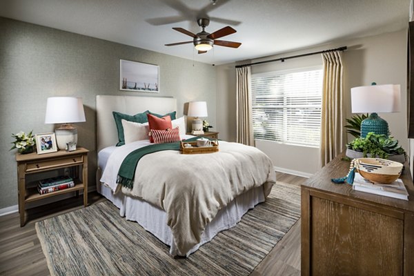 Cozy bedroom with coastal decor in Seacrest Apartment Homes