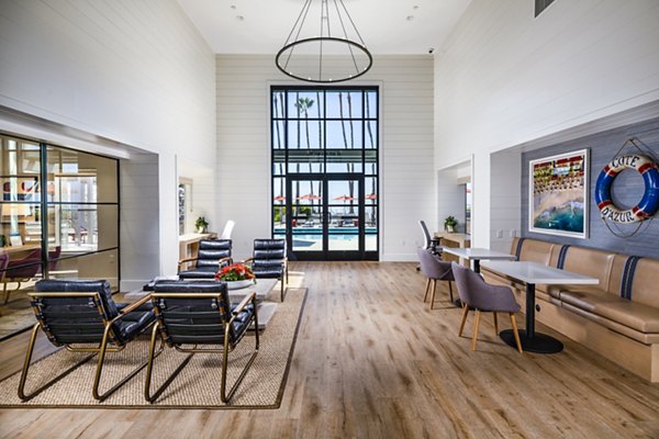 Clubhouse lobby with modern furnishings at Seacrest Apartment Homes offering luxurious amenities for residents