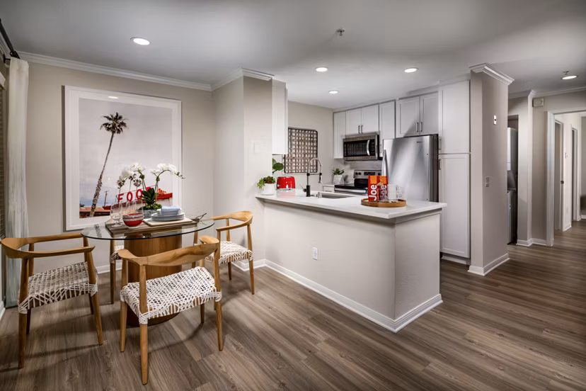 Dining room with elegant furnishings and ocean views at Seacrest Apartment Homes
