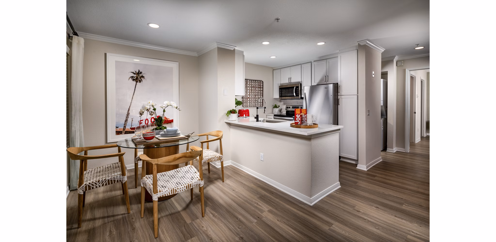 Dining room with elegant furnishings and ocean views at Seacrest Apartment Homes