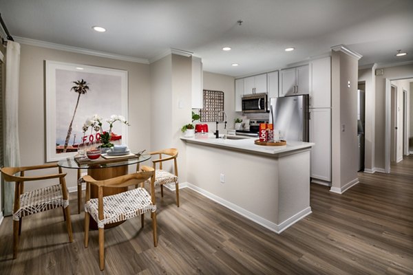 Dining room with elegant furnishings and ocean views at Seacrest Apartment Homes