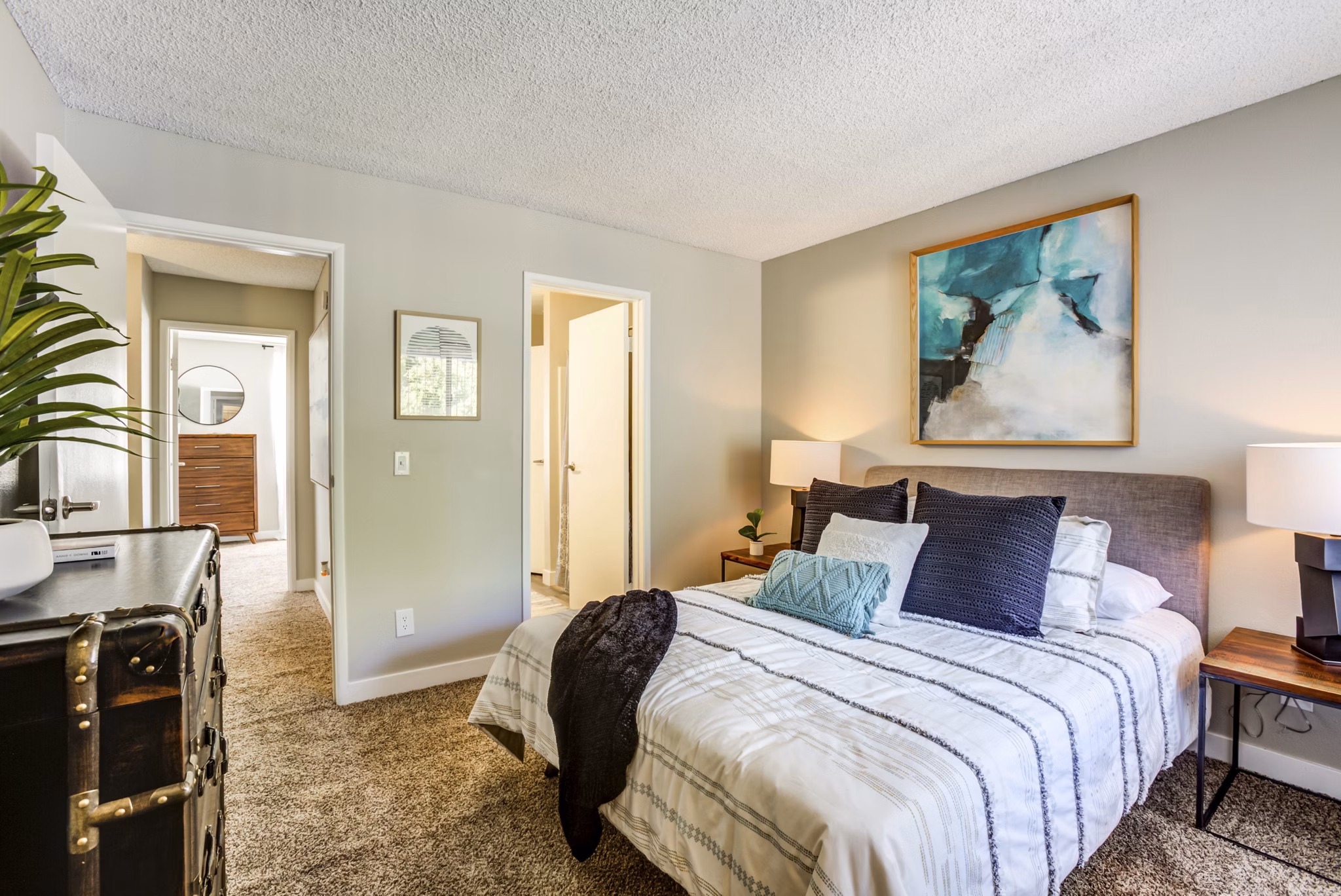 Bedroom with modern decor and ample natural light at Avana Chandler Apartments, a luxury living space perfect for style and comfort seekers