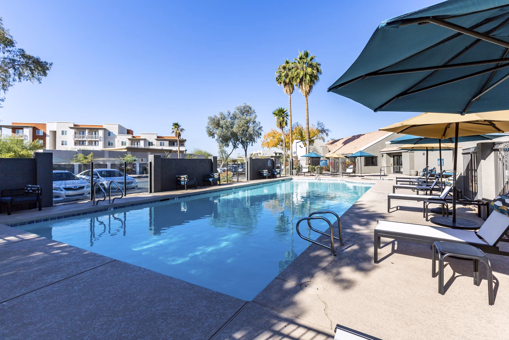 Resort-style pool at Avana Chandler Apartments with luxurious lounging spaces