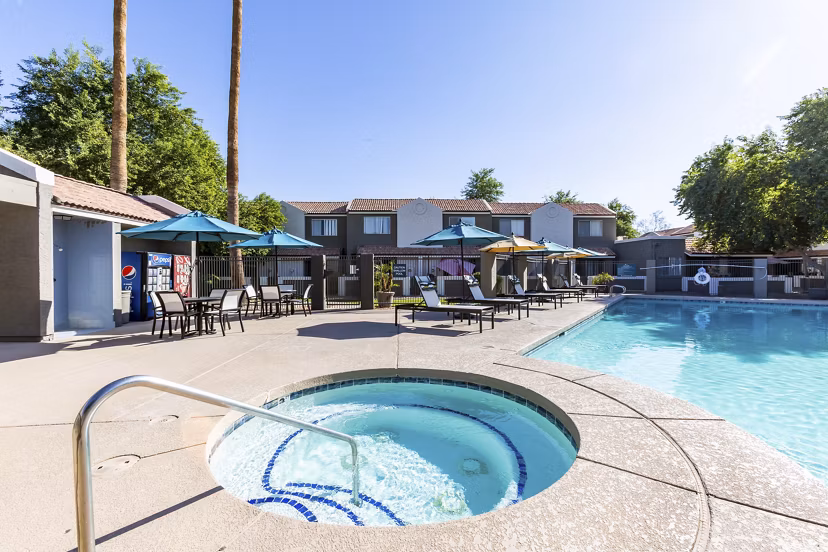 Hot tub jacuzzi at Avana Chandler Apartments offering luxurious relaxation for residents in a serene setting