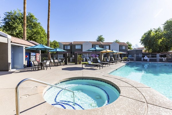 Hot tub jacuzzi at Avana Chandler Apartments offering luxurious relaxation for residents in a serene setting