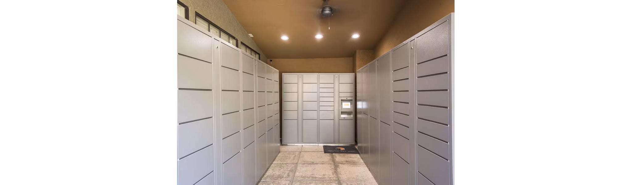 Modern mail room with secure parcel lockers at Avana Gilbert apartments
