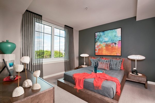Spacious bedroom with modern decor and ample natural light at Estuary Apartments
