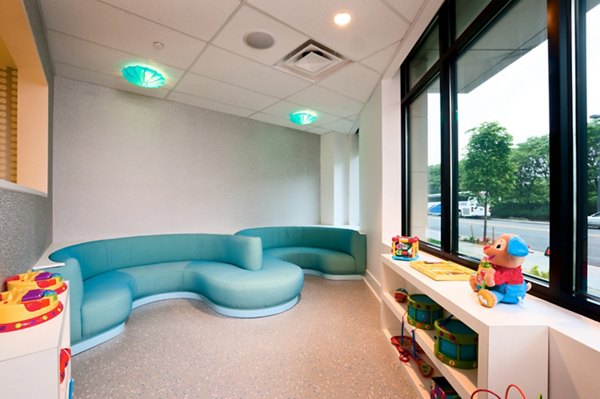 Elegant clubhouse with modern furnishings at Estuary Apartments, offering luxury living experiences for residents