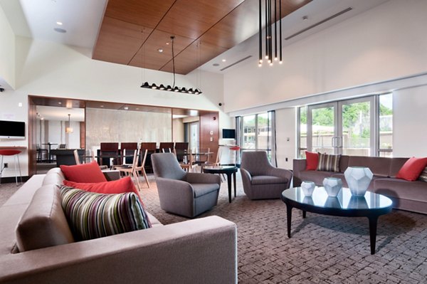 Modern clubhouse with stylish decor at Estuary Apartments offering comfortable social spaces for residents