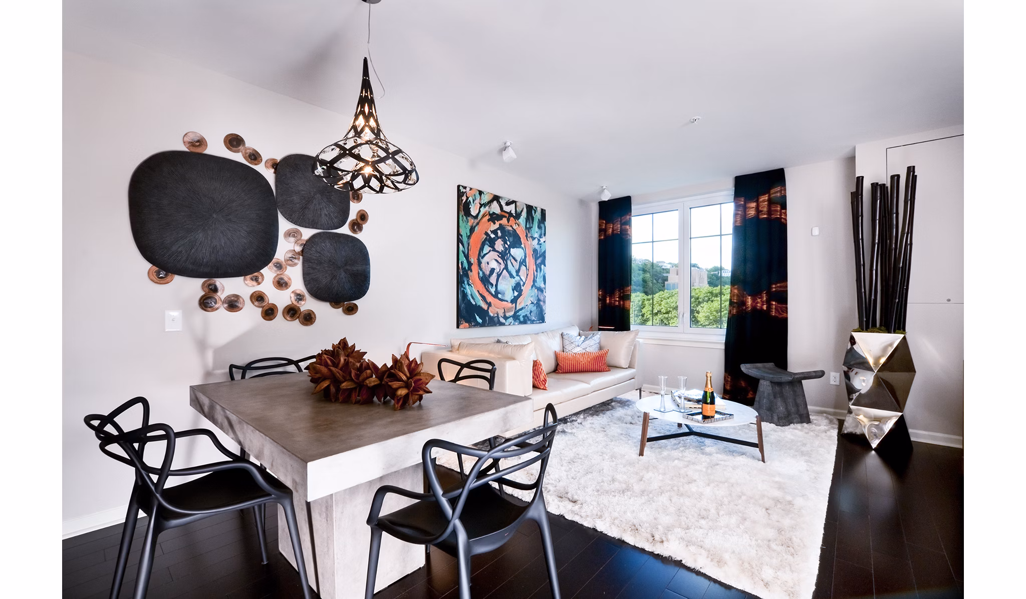 Spacious living room with natural light and modern furnishings in Estuary Phase II Apartments