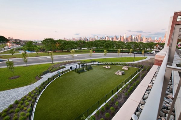 Estuary Apartments: Scenic waterfront view at luxury apartments in Weehawken, NJ.
