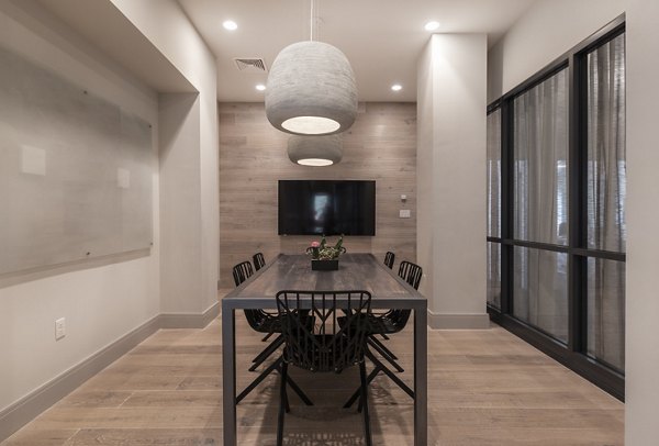 Modern meeting facility equipped with advanced technology at West of Chestnut Apartments