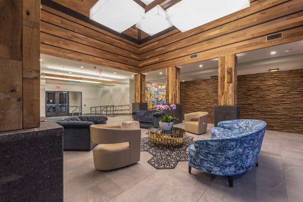 Clubhouse featuring modern design elements at West of Chestnut Apartments, a luxury property by Greystar