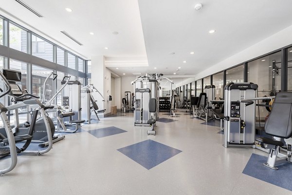 Modern fitness center with state-of-the-art equipment at West of Chestnut Apartments, ideal for an active lifestyle