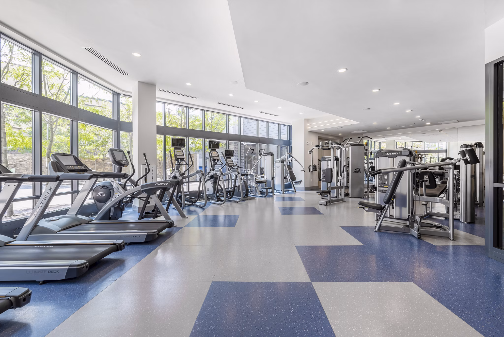 Fitness center with modern equipment at West of Chestnut Apartments