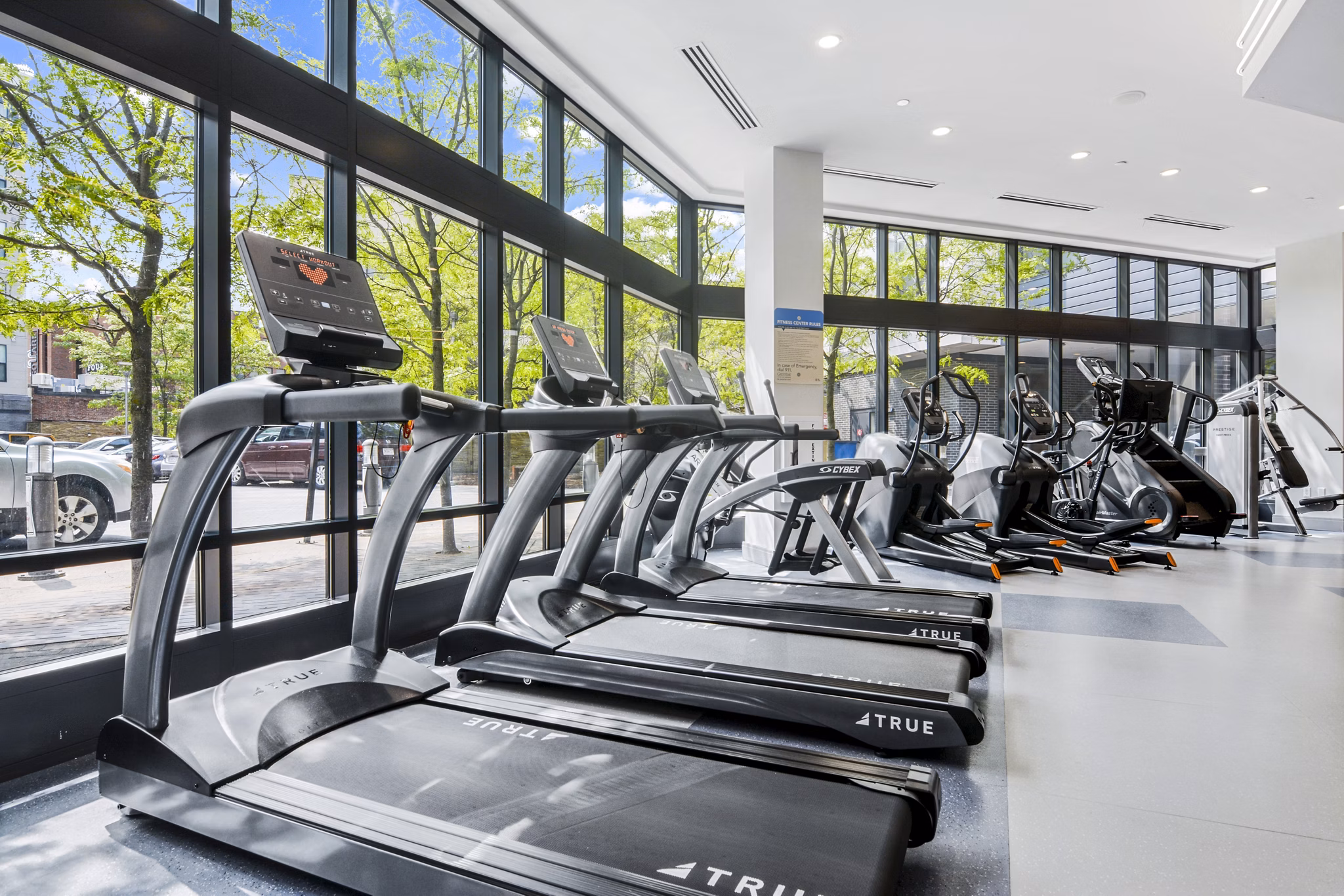 Fitness center equipped with state-of-the-art machines at West of Chestnut Apartments