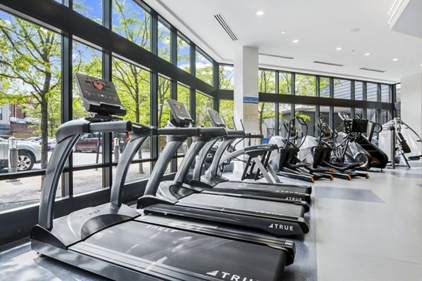 Fitness center equipped with state-of-the-art machines at West of Chestnut Apartments