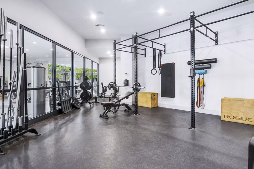 Modern fitness center at West of Chestnut Apartments with state-of-the-art equipment and spacious workout areas