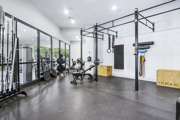 Modern fitness center at West of Chestnut Apartments with state-of-the-art equipment and spacious workout areas