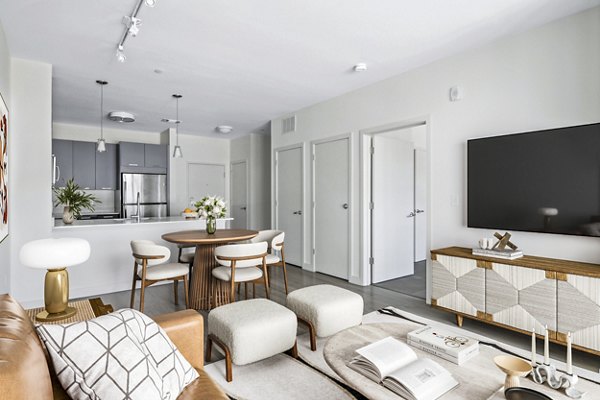 Inviting living room with contemporary decor at West of Chestnut Apartments