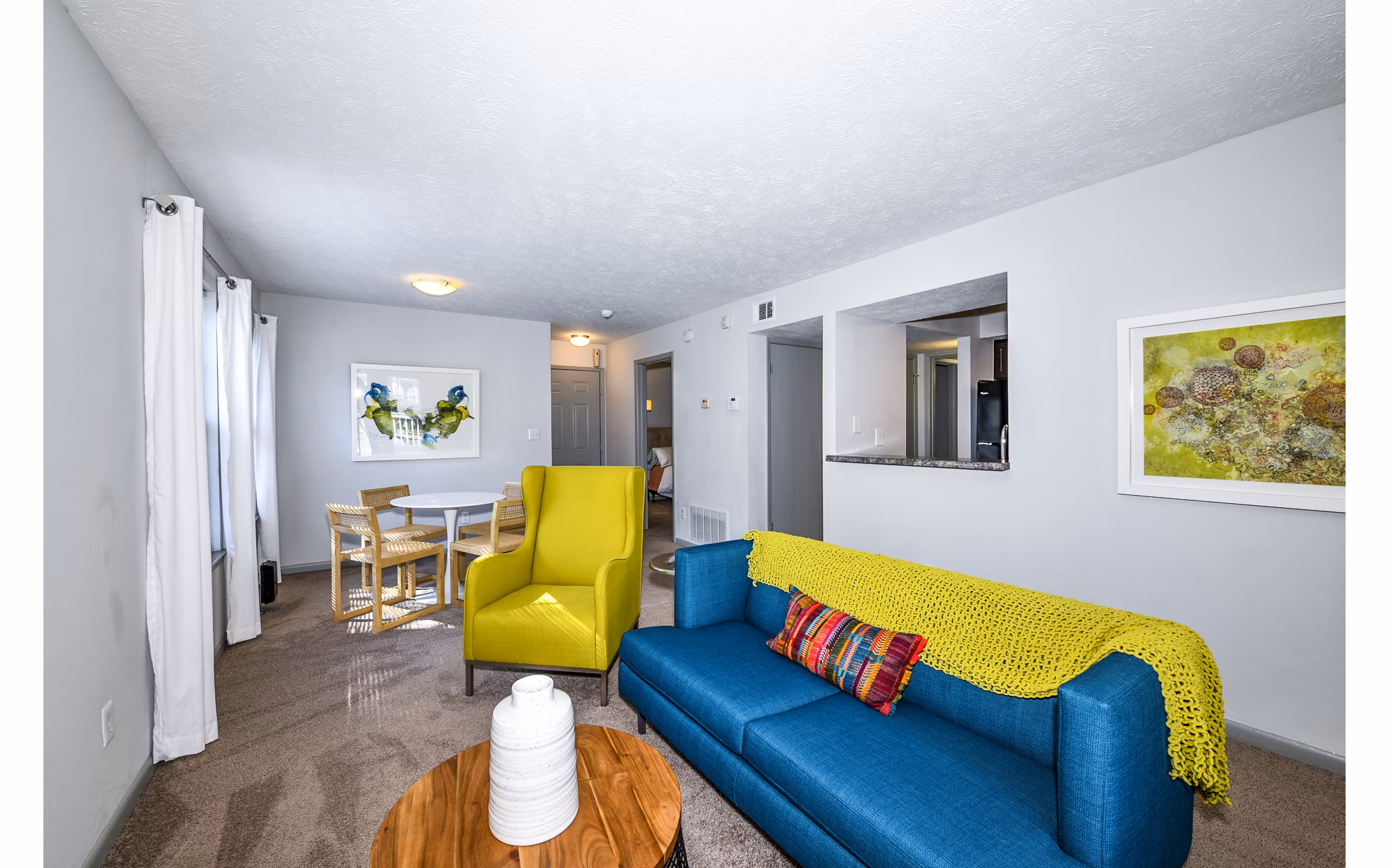 Cozy living room with modern furnishings in Avana Woods Apartments