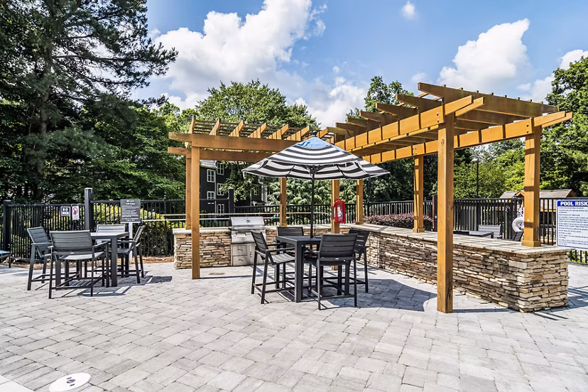 Outdoor barbecue grill area at Avana Woods Apartments, perfect for social gatherings and culinary adventures