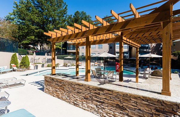 Serene outdoor pool at Avana Woods luxury apartments, perfect for relaxation and leisure