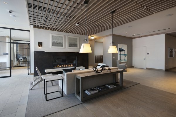 Contemporary clubhouse featuring a stylish lounge area at Helm Apartments in San Francisco