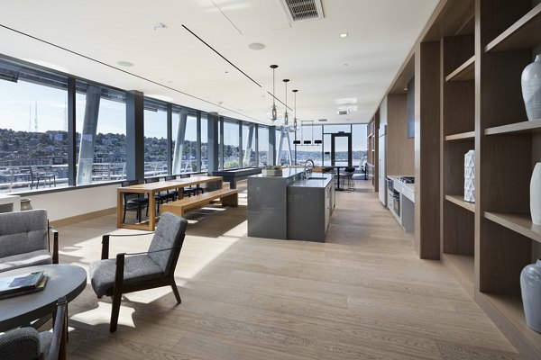 Modern clubhouse featuring a sleek design and comfortable seating at Helm Apartments