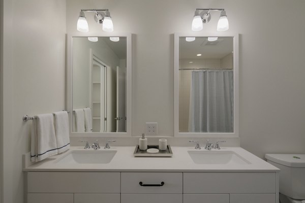 Bathroom featuring modern fixtures and elegant design at Mera Apartments