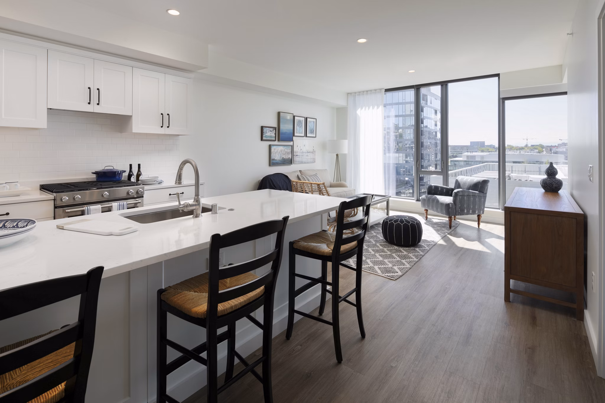 Kitchen featuring modern appliances and granite countertops in Mera Apartments