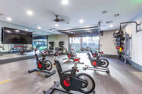 fitness center at The Art on Highland Apartments
