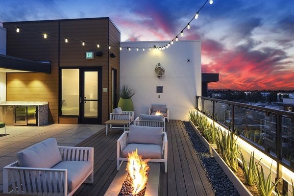 fire pit/patio at The Art on Highland Apartments