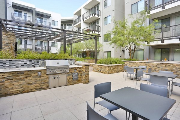 grill area/patio at The Art on Highland Apartments