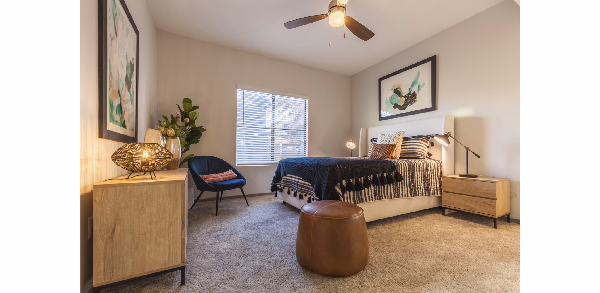 Spacious bedroom with modern decor at Circ Apartments, a luxury living option by Greystar in downtown city center