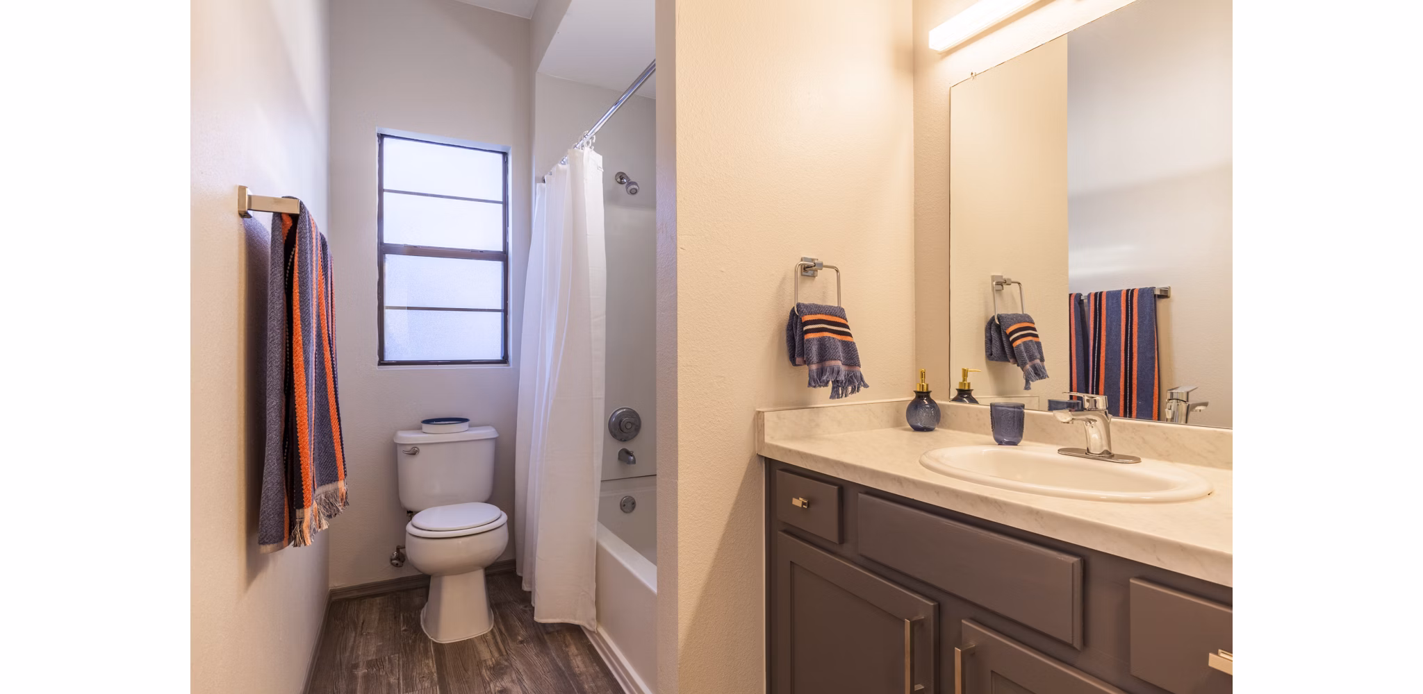 Luxurious bathroom featuring sleek fixtures and marble accents in Circ Apartments