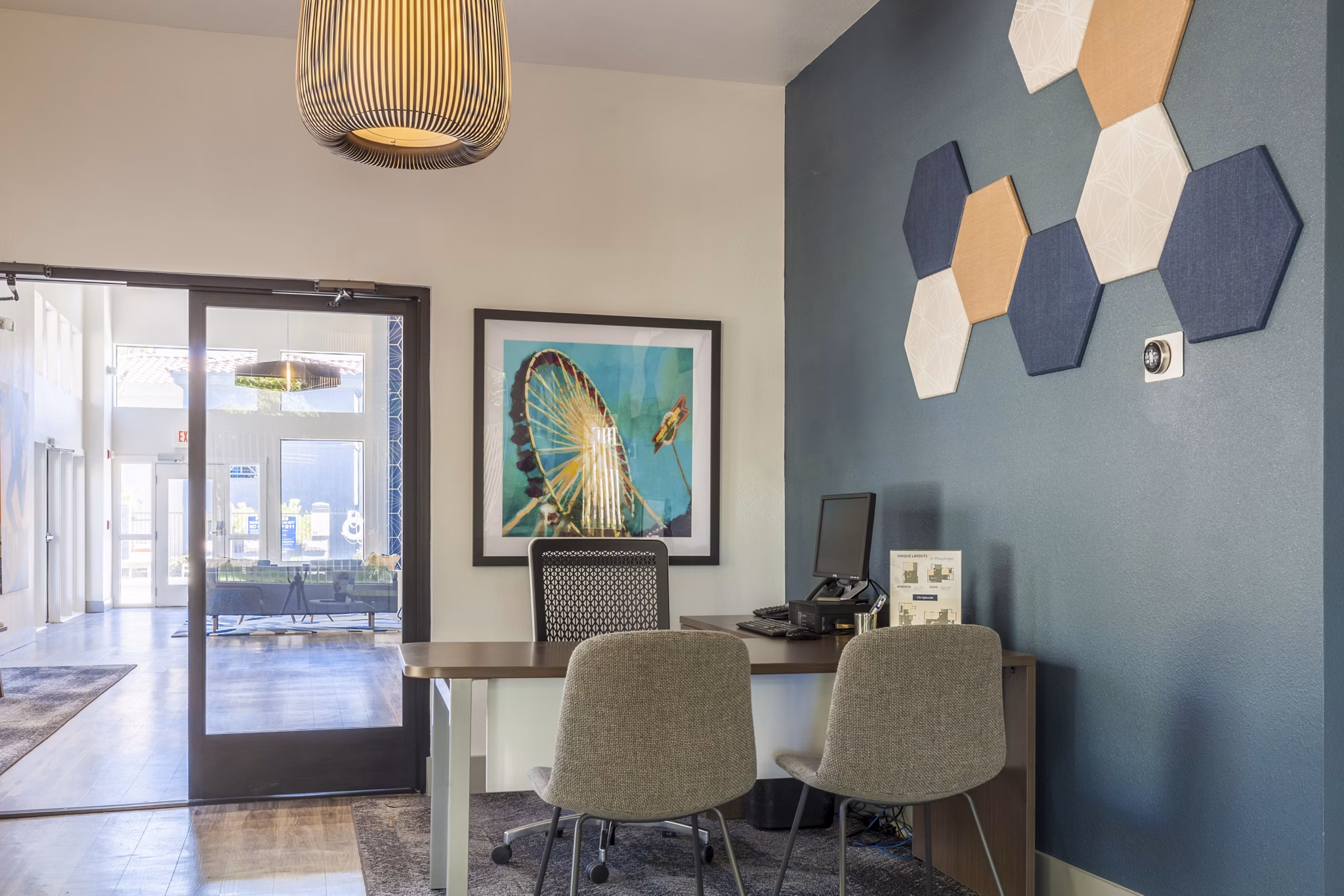 Clubhouse with modern decor and seating at Circ Apartments