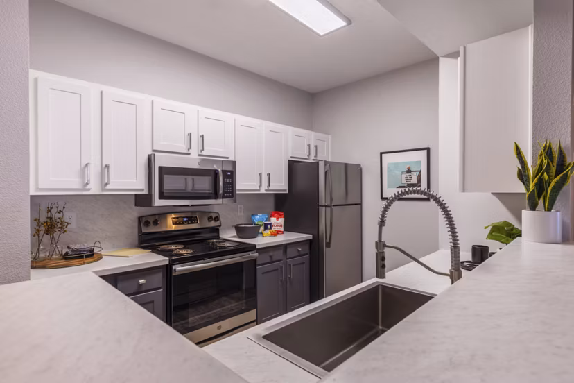 Spacious kitchen with modern appliances in Circ Apartments, a Greystar luxury community