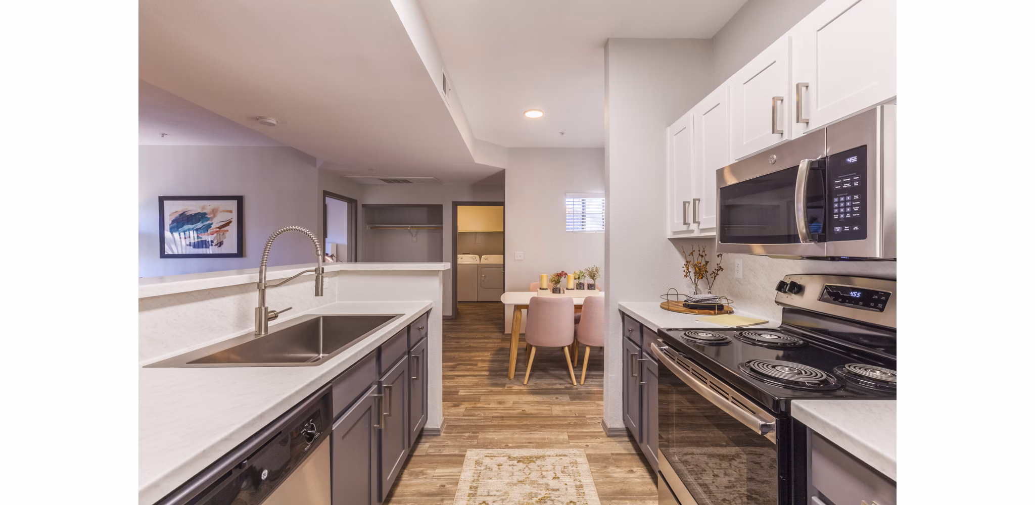 Modern kitchen with stainless steel appliances in Circ Apartments, a luxury property managed by Greystar