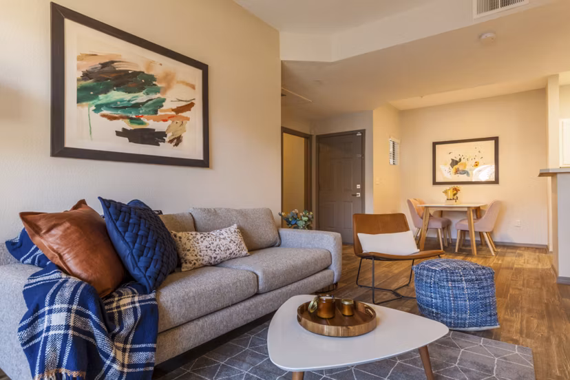 Spacious living room with modern furnishings at Circ Apartments in vibrant downtown setting
