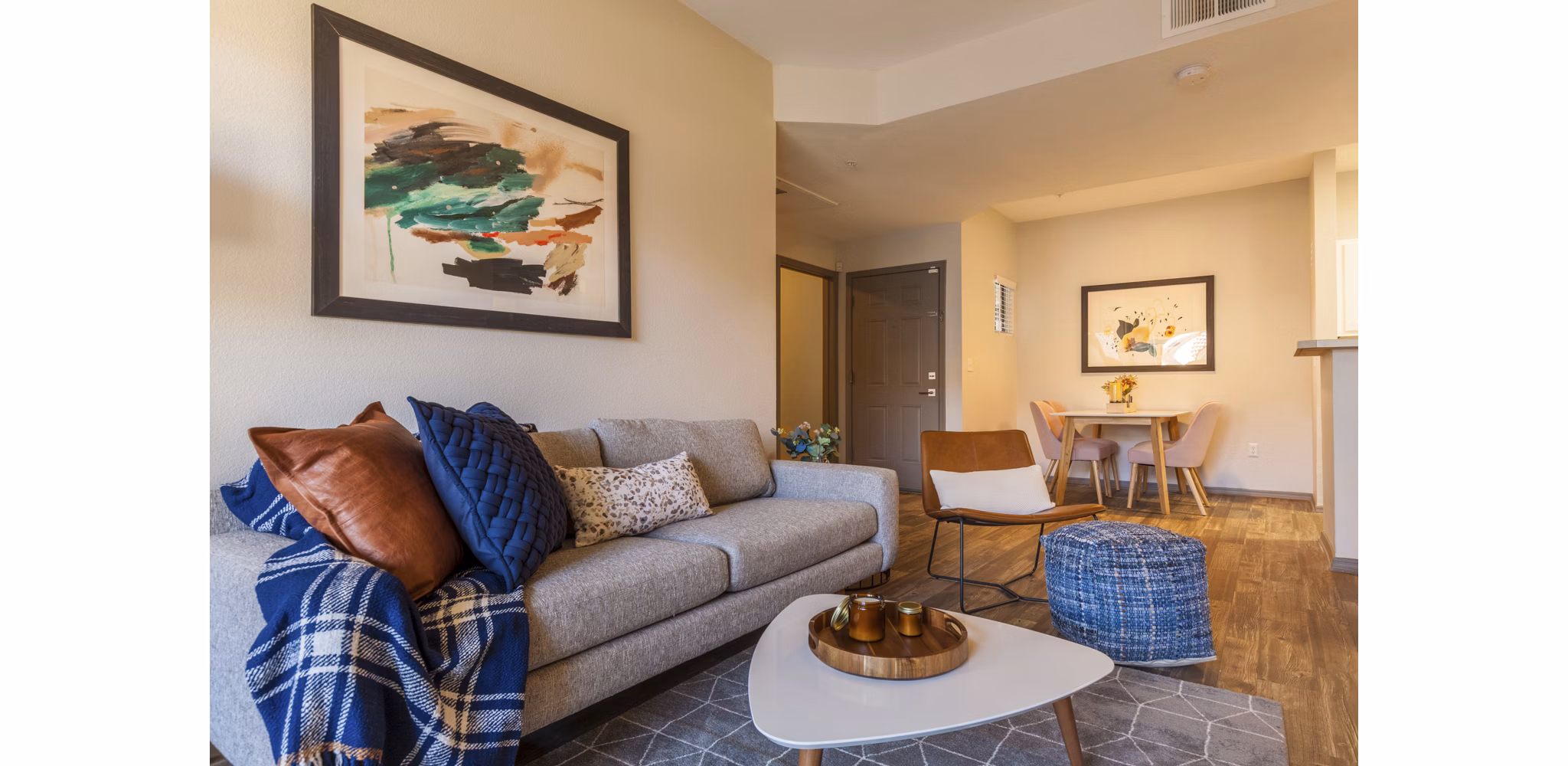 Spacious living room with modern furnishings at Circ Apartments in vibrant downtown setting