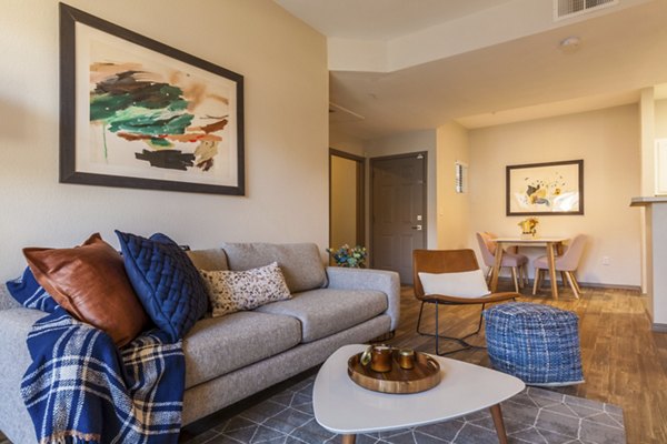 Spacious living room with modern furnishings at Circ Apartments in vibrant downtown setting