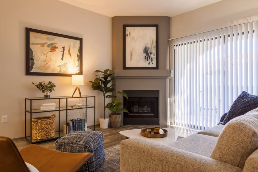 Sunlit modern living room with plush seating and sleek finishes at Circ Apartments