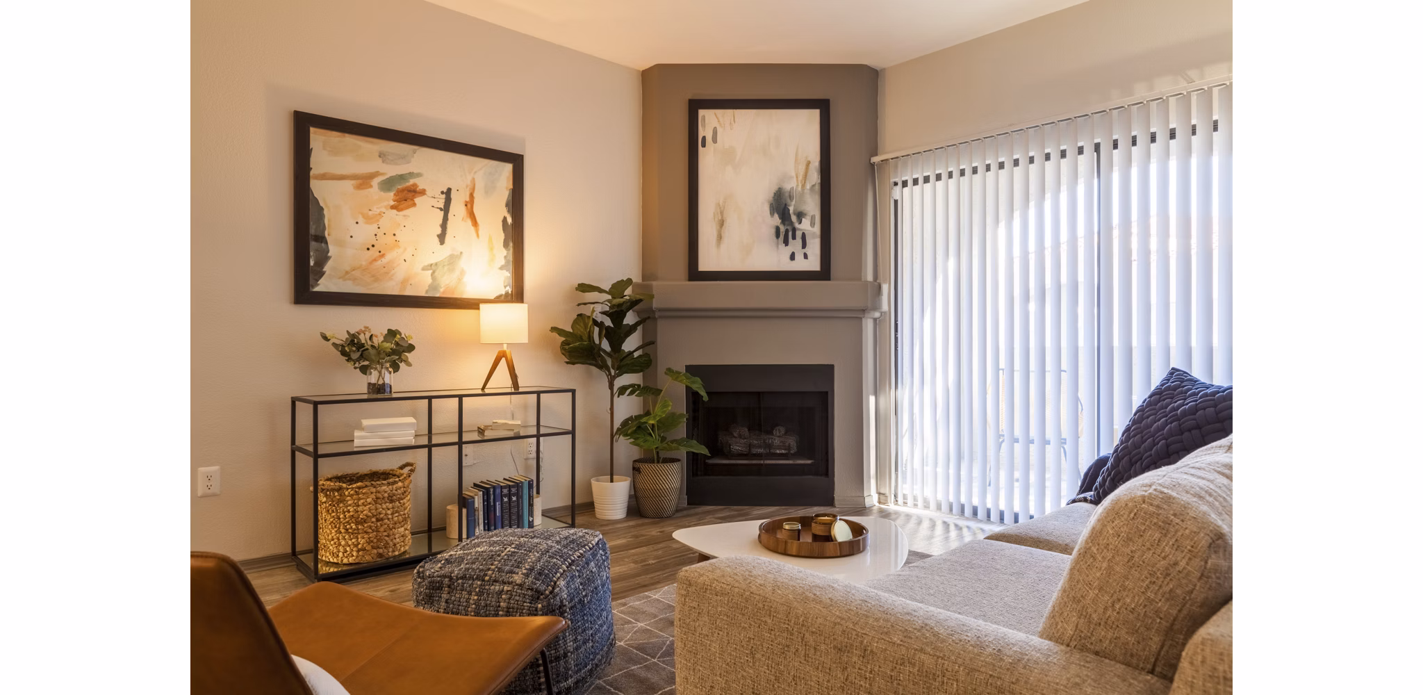 Sunlit modern living room with plush seating and sleek finishes at Circ Apartments