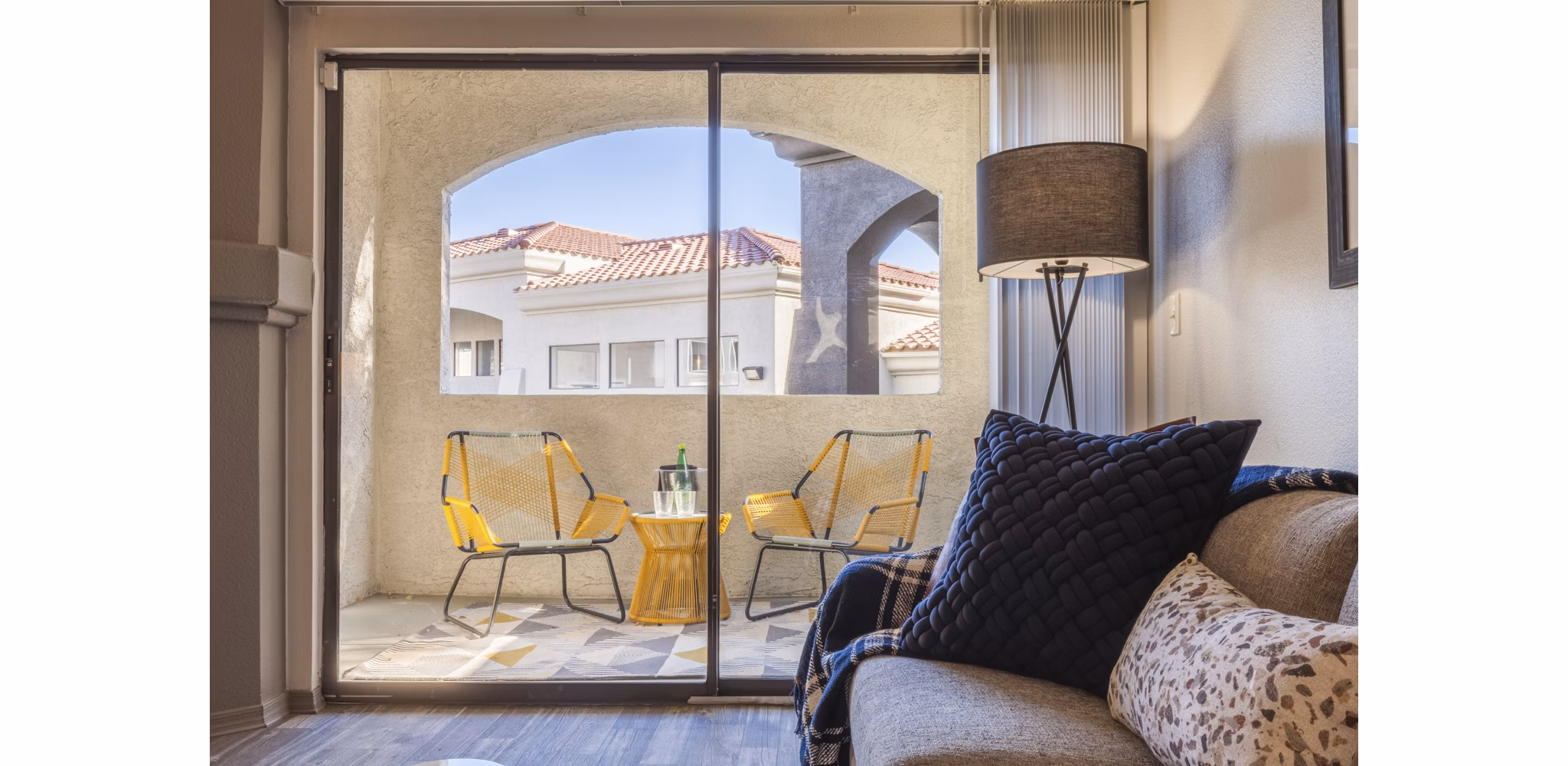 Tranquil outdoor patio with modern seating at Circ Apartments