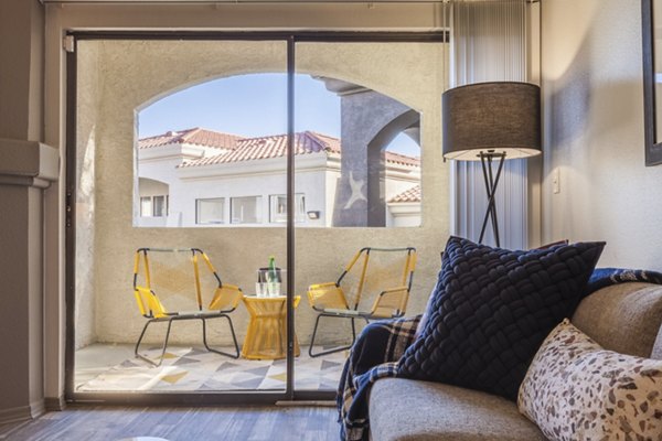 Tranquil outdoor patio with modern seating at Circ Apartments