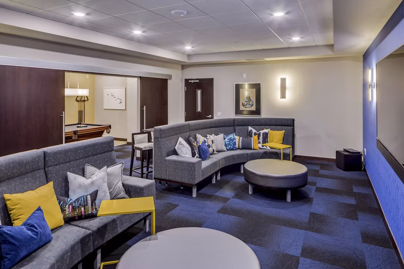 Theater with plush seating and state-of-the-art acoustics at The Paxon Apartments