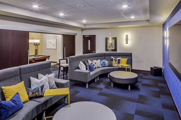 Theater with plush seating and state-of-the-art acoustics at The Paxon Apartments