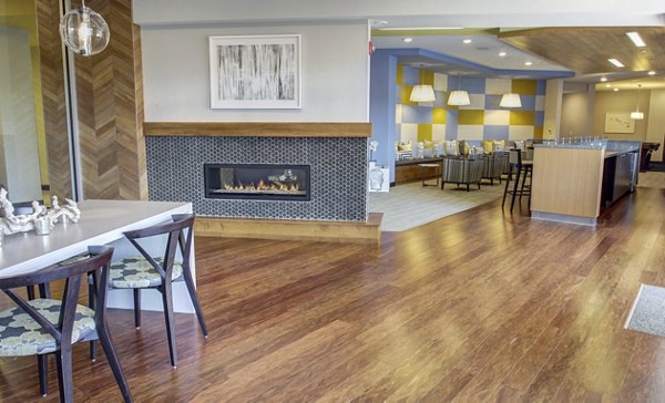Clubhouse with modern furnishings and stylish decor at The Paxon Apartments, a luxury community ideal for social gatherings and relaxation